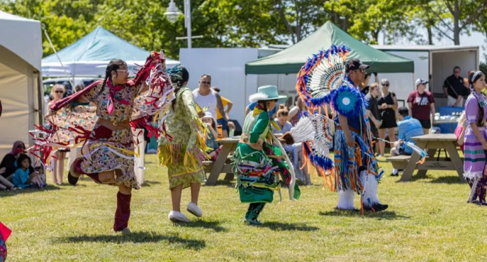 A group of Indigenous dancers.