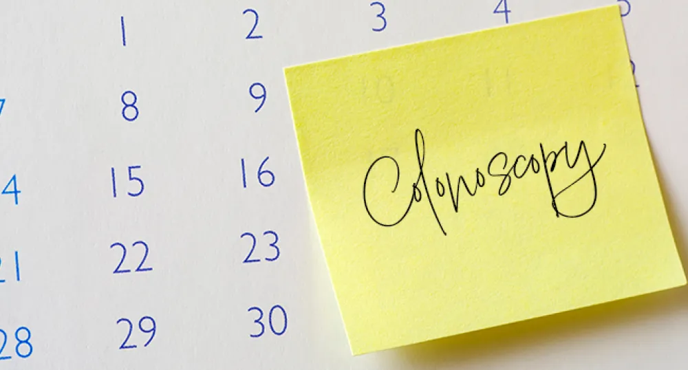 Request to Self-Refer for a Colonoscopy A yellow sticky note with the word Colonoscopy written on it