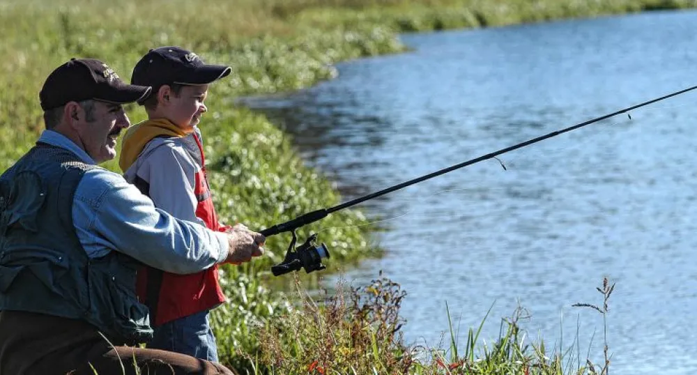 Trout fishing Father and son trout fishing