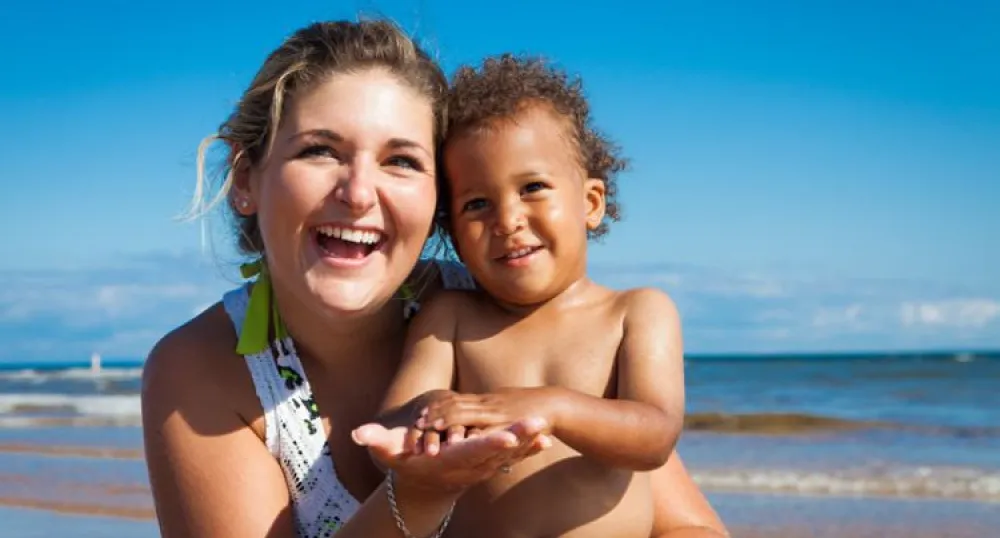Woman and child at the beach