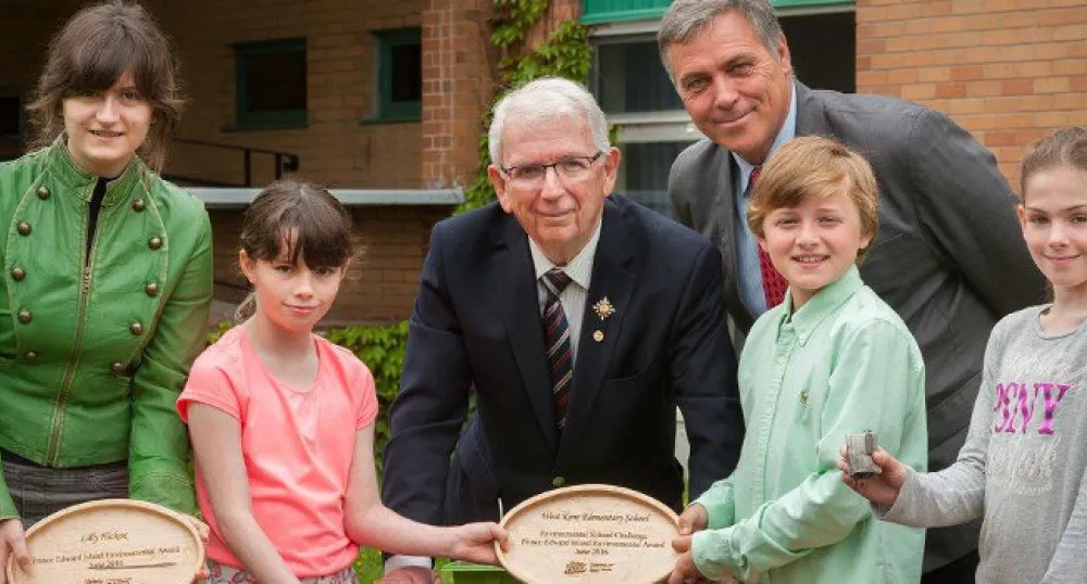 Photo of Lt. Governor Frank Lewis and Minister Robert Mitchell with some of the 2016 Environmental Award winners