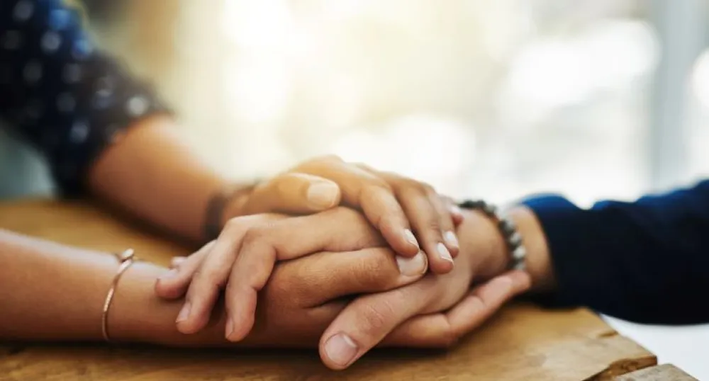 two hands holding