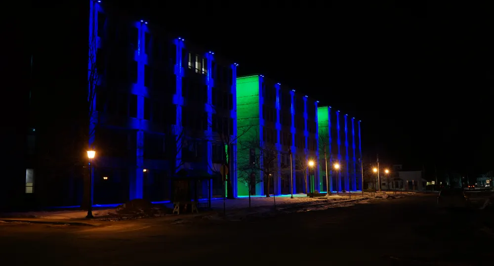 Colourful lights illuminating Sullivan Building