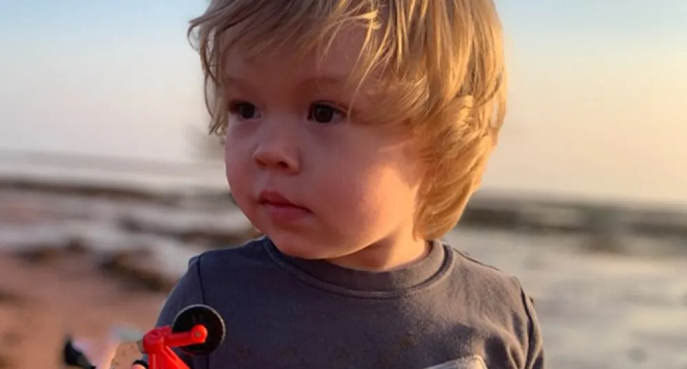 Link Morgan playing at the beach