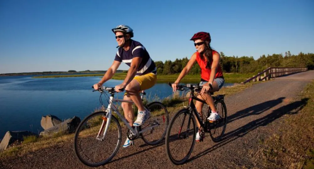 Couple biking on Confederation Trail