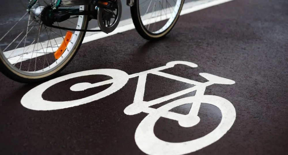 Active Transportation Fund Calling for Year Two Applicants image of bike tires on a paved shoulder