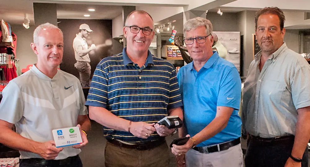 Ryan Garrett, Minister Chris Palmer, Terry Hamilton and TIAPEI President Robert Jourdain 