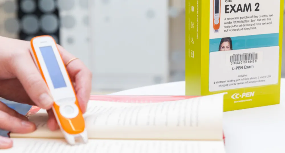 PEI Public Library Service adds assistive technology to their collection Image of person using C-pen