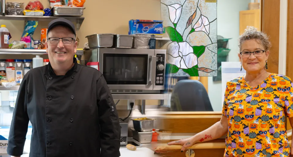 image of two people in health care work stations