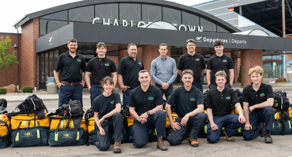 Rob Lantz with 10 wildfire fighters from PEI