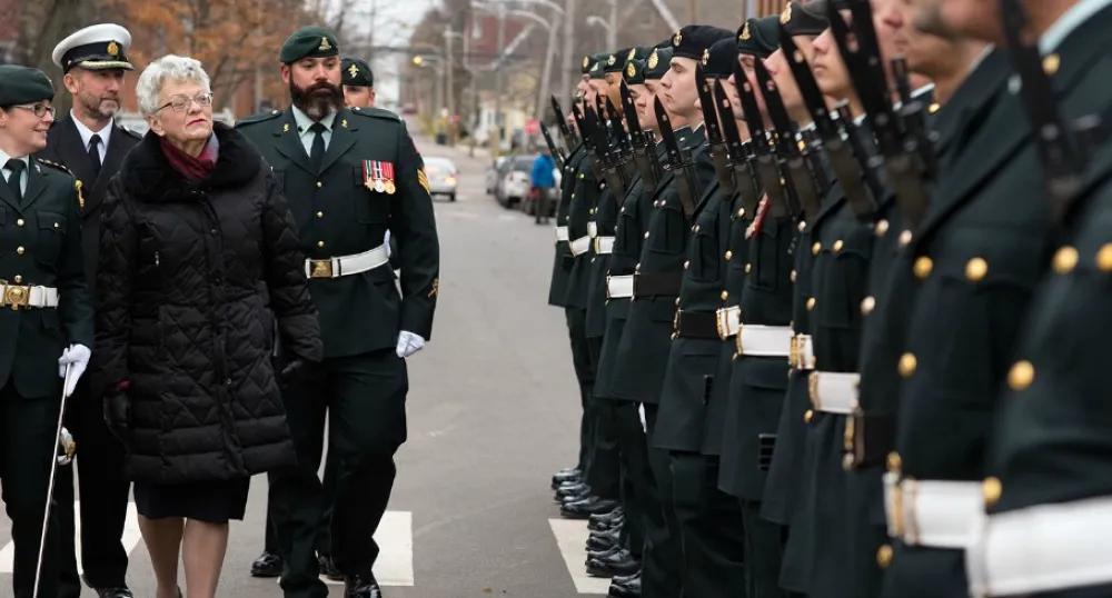 Throne Speech charts path forward for growing, diversified province Photo shows lieutenant governor reviewing honor guard