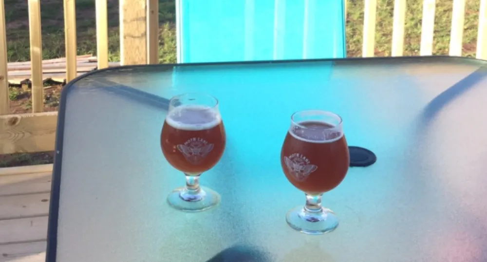 Beer glasses on patio table