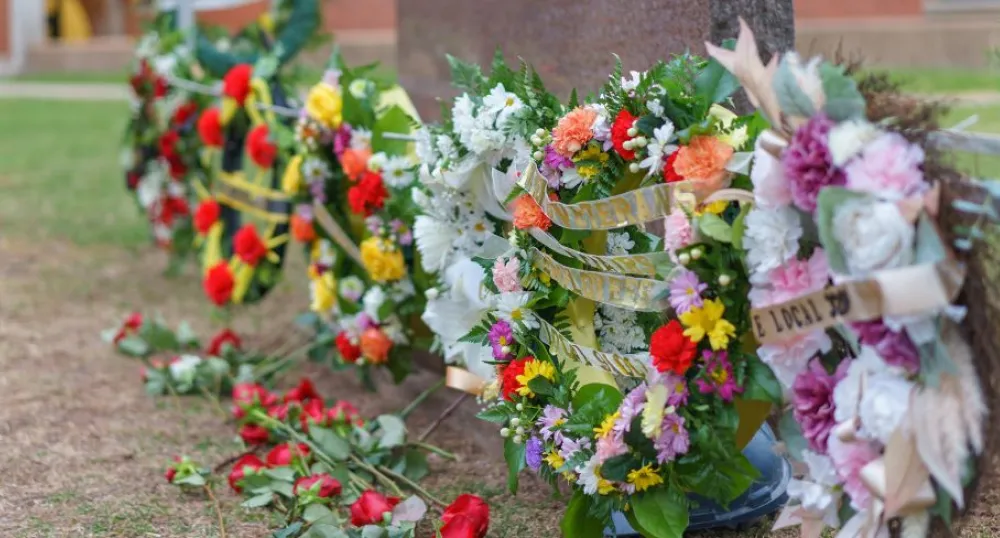 photo of wreaths at ceremony
