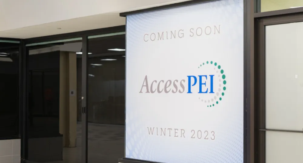 New Access PEI location offers enhanced services for Islanders image of a white sign in front of a mall storefront window