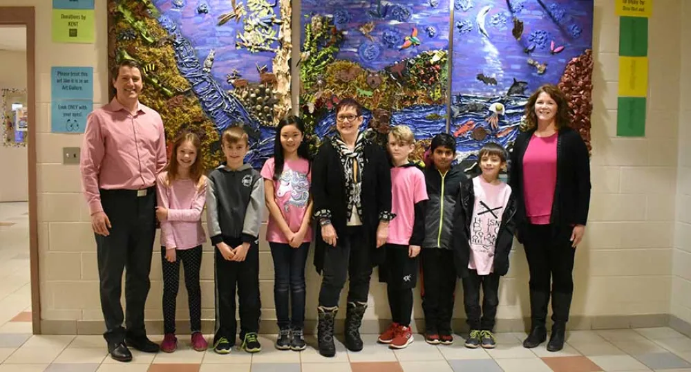 Minister Jordan Brown with artist Dina Blot, West Royalty Elementary teacher Tracey Smith and students Minister Jordan Brown with artist Dina Blot, West Royalty Elementary teacher Tracey Smith and students