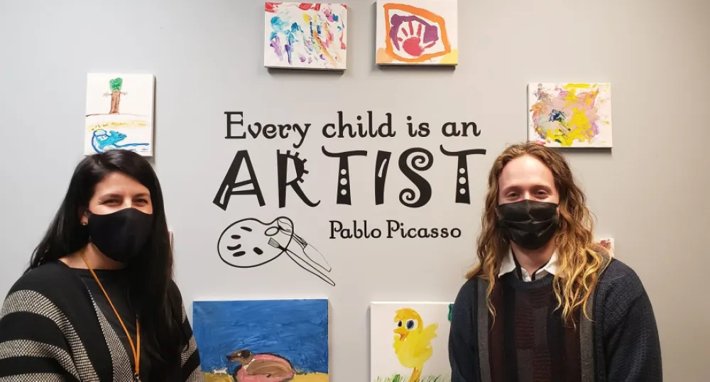 two women in masks 