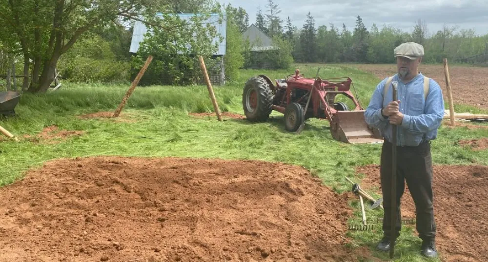 Sowing the seeds of culture with new educational project image of a person in a garden beside a field and tractor