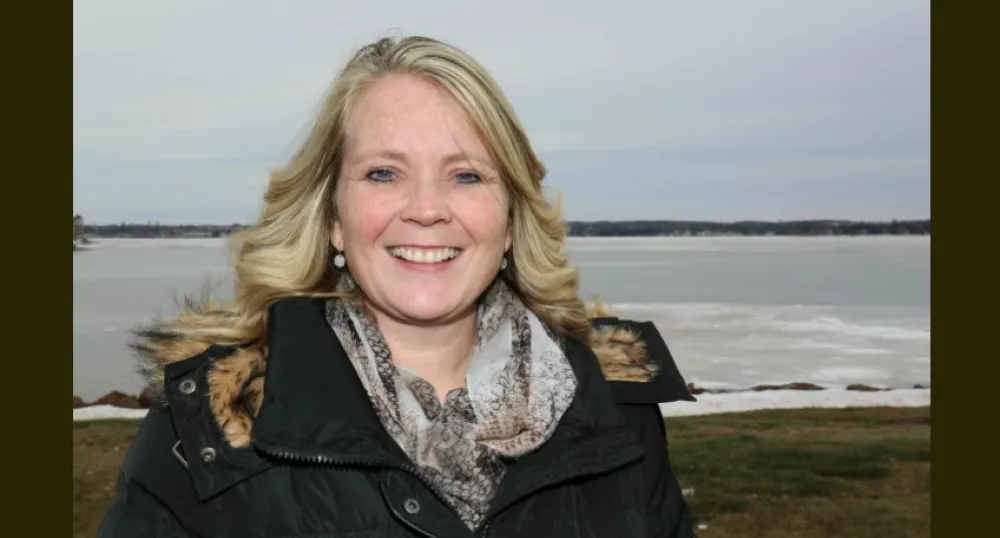 Tracey Gallant, from Cornwall, is shown in the foreground of a winter water-front scene