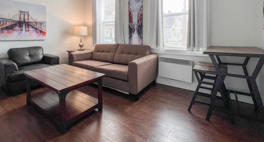 Expanding supportive housing for Islanders image of a room with coahes and chairs