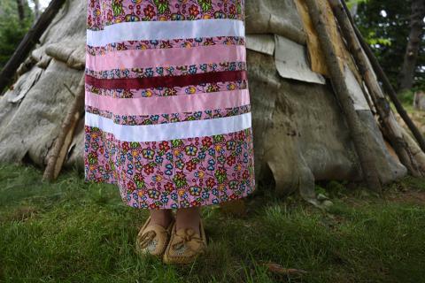 Ribbon skirt and moccasins created by Carolyn Sark. Photo: Jenene Wooldridge