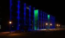 Image of shaw building with lights at night