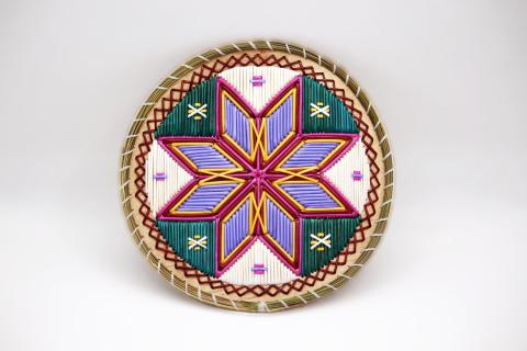 Amasipuk (2021), a work by Melissa Peter-Paul made of porcupine quills, sweet grass, birch bark and sinew