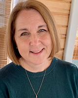 Angela Carragher, Physiotherapist