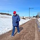Leon Robinson walking on a trail