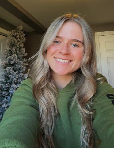 A smiling young woman