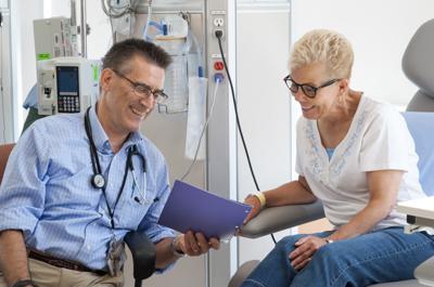 doctor taking some ones blood pressure