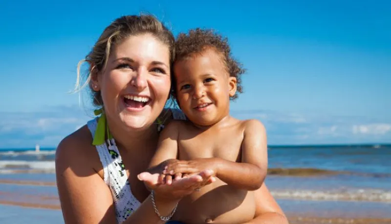 Woman and child at the beach
