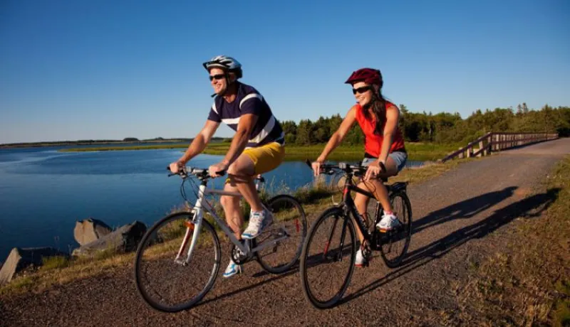 Couple biking on Confederation Trail