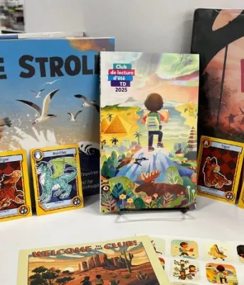 Several children&#039;s books and dragon cards from the library.