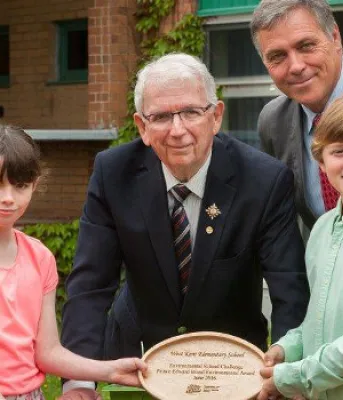 Photo of Lt. Governor Frank Lewis and Minister Robert Mitchell with some of the 2016 Environmental Award winners