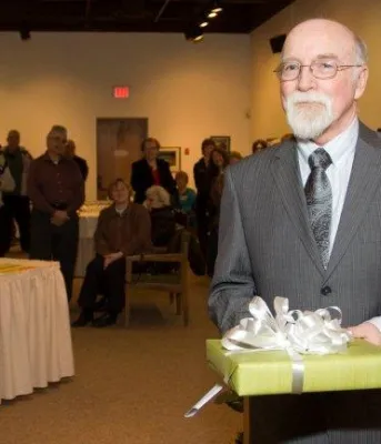 Former poet laureate Hugh MacDonald