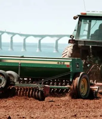 tractor plowing a field
