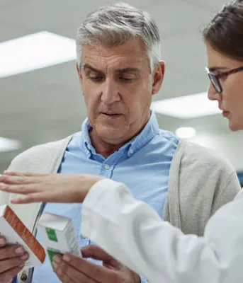 pharmacist talking to someone