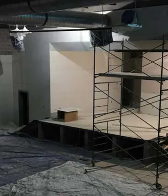 French school renovation nears completion Photo shows interior construction of a large space at the new French school.