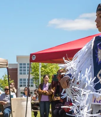 Image of traditional dancers at pow wow at Confederation Landing Park, Charlottetown PEI