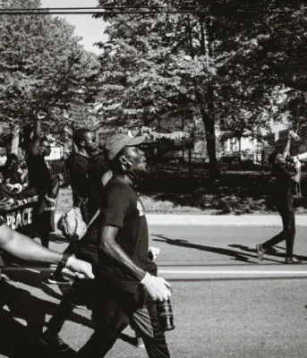 image of people marching on a street
