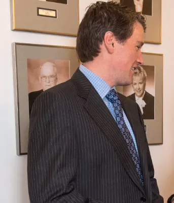 Province continues to support Island artists Photo shows two women talking with Minister Jordan Brown