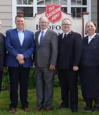 Provincial investment enhances Bedford MacDonald House A row of people standing shoulder to shoulder
