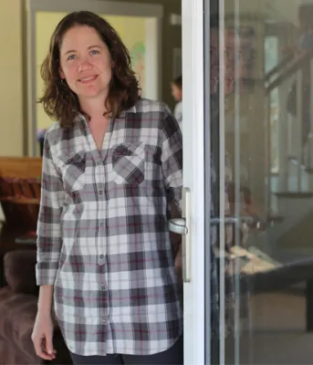 Beth Peters Beth Peters at her passive solar house in Long River