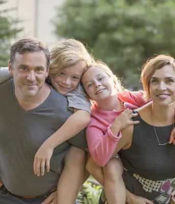 Bonnie Stewart and family Bonnie Stewart and her partner Dave Cormier post while giving their children piggy-back rides