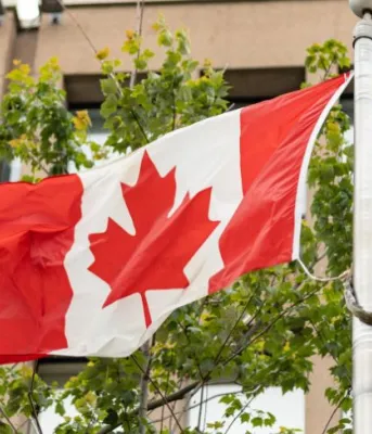 Statement by Premier King on Canada Day image of a flag in front of a building