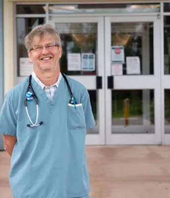 Dr. Roberto Campanaro standing outside the front entrance to Western Hospital