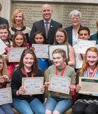 Students receive awards for their projects at the Provincial Heritage Fair. Students receive awards for their projects at the Provincial Heritage Fair.