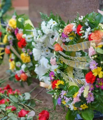 photo of wreaths at ceremony
