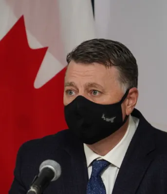 Masks to become mandatory in Prince Edward Island Image of a person wearing a non medical mask
