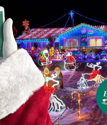 Premier King and Dr. Morrison brief Santa Claus on COVID-19 restrictions on PEI and verifies VaxPass image of Santa holding his cellphone with a confirmed VaxPass message on it